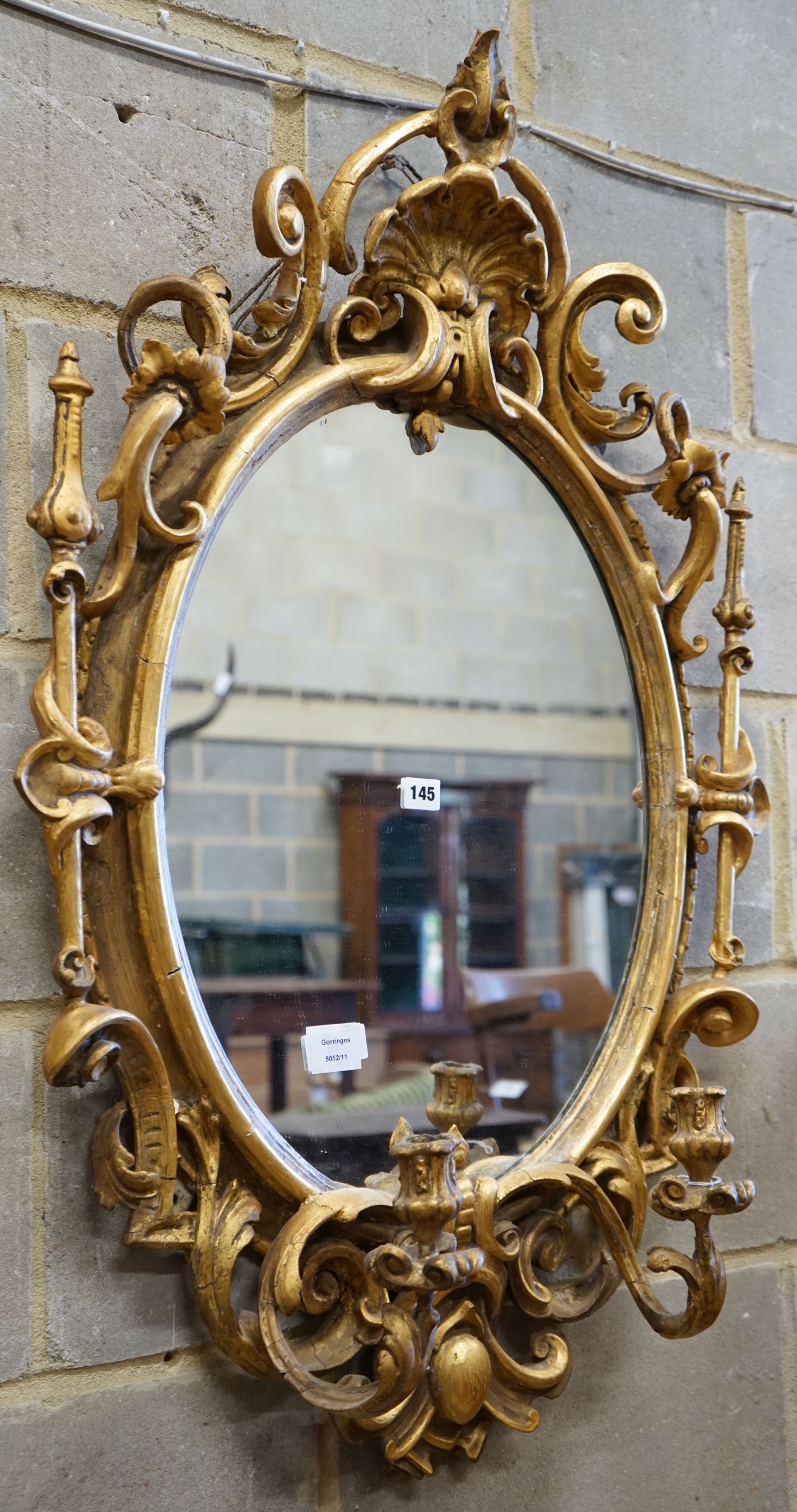 A Victorian giltwood and gesso girandole, width 65cm, height 100cm